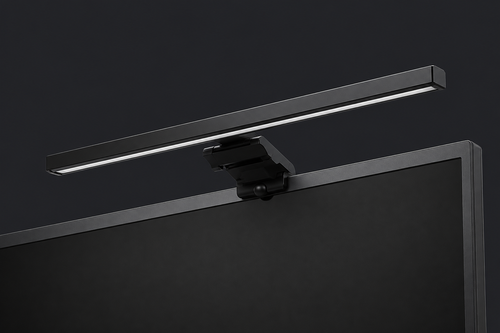 Barra de luz ErgoStruct en acabado negro montada sobre el borde superior de un monitor